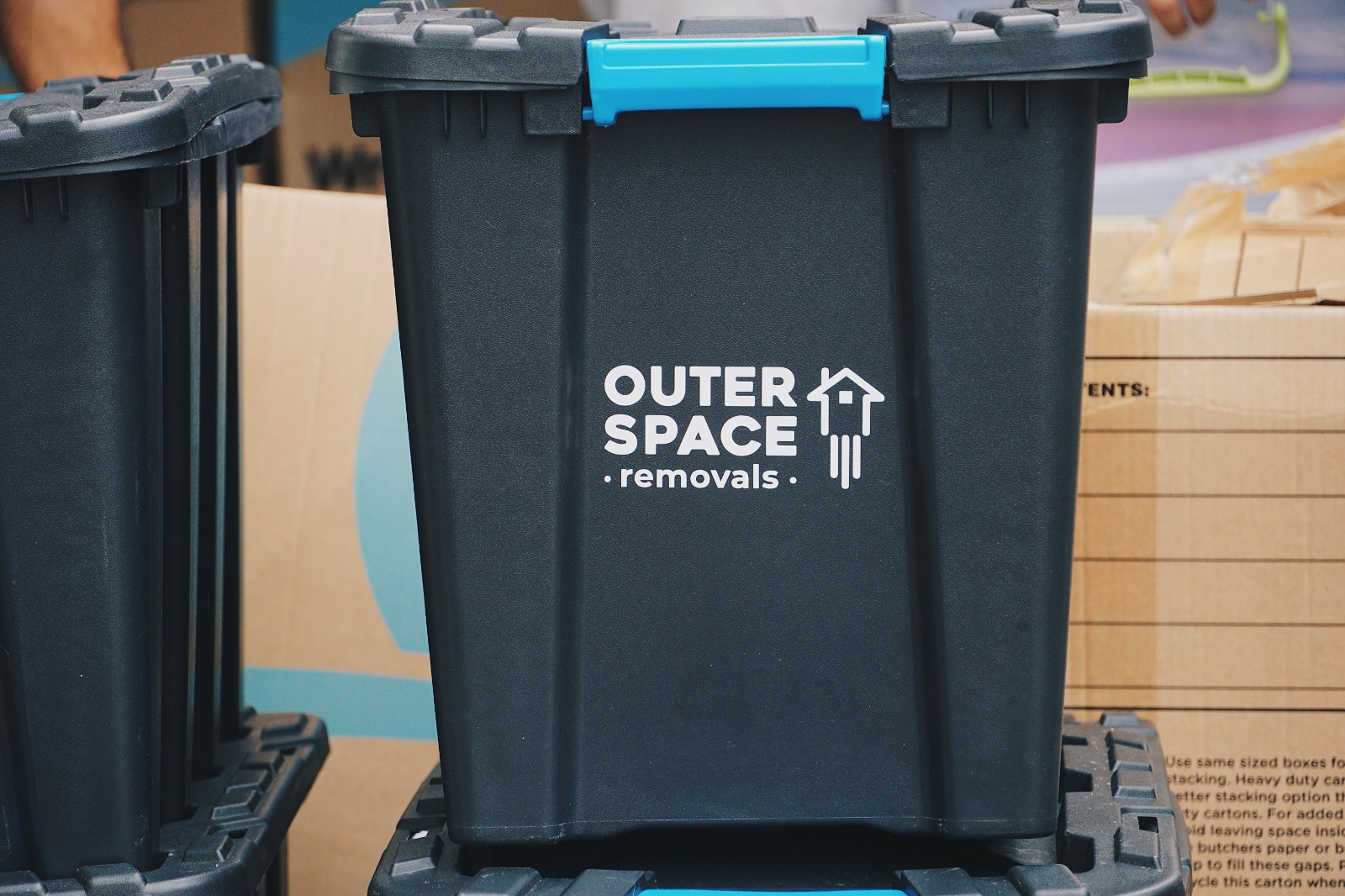 Close-up of an Outer Space branded crate